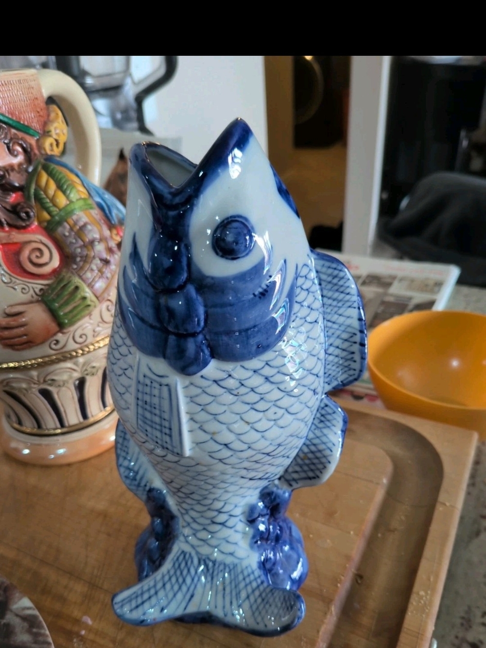 vintage ceramic vase features a beautiful blue and white design Koi